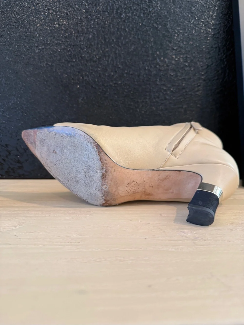 CHANEL Beige Leather Ankle Boots with Black Cap Toe